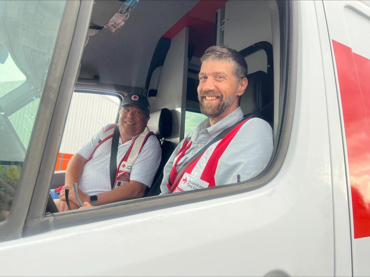 Warren Weathers and Curtis Jack drive an Emergency Response Vehicle