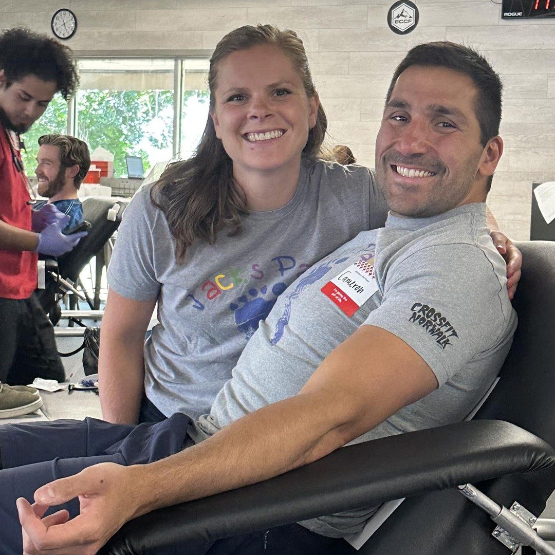 Friends, family, Red Crossers and CrossFit athletes together at a blood drive