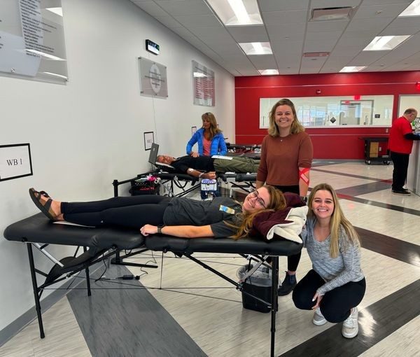 Blood donor Therese Egan and her grandchildren