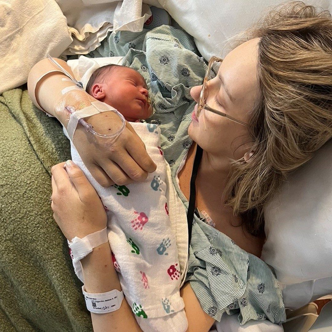 Lucy Newman holds her daughter Daisy.