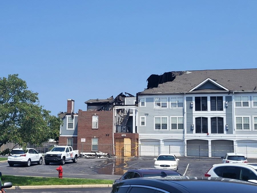 Apartment complex fire with building destroyed.