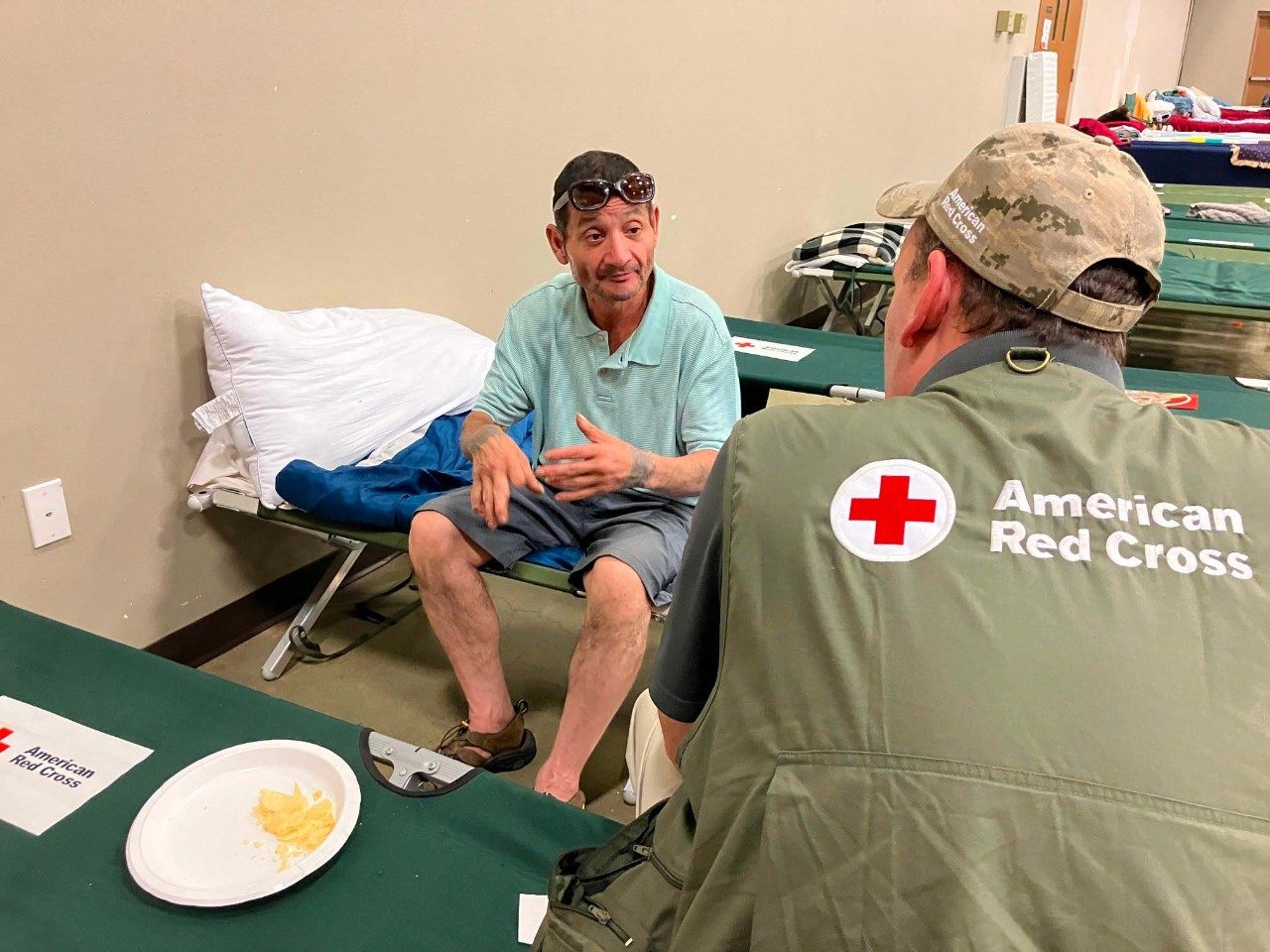 Rock Valley resident Apolinar with a volunteer