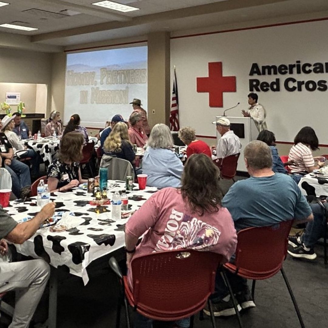 red crossers at meeting