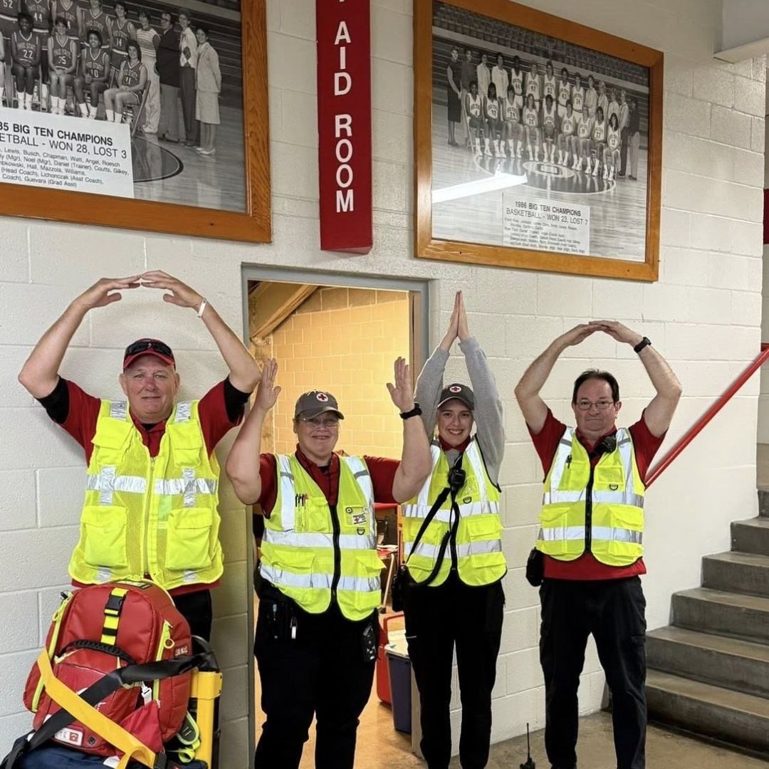group of red crossers outside first aid room