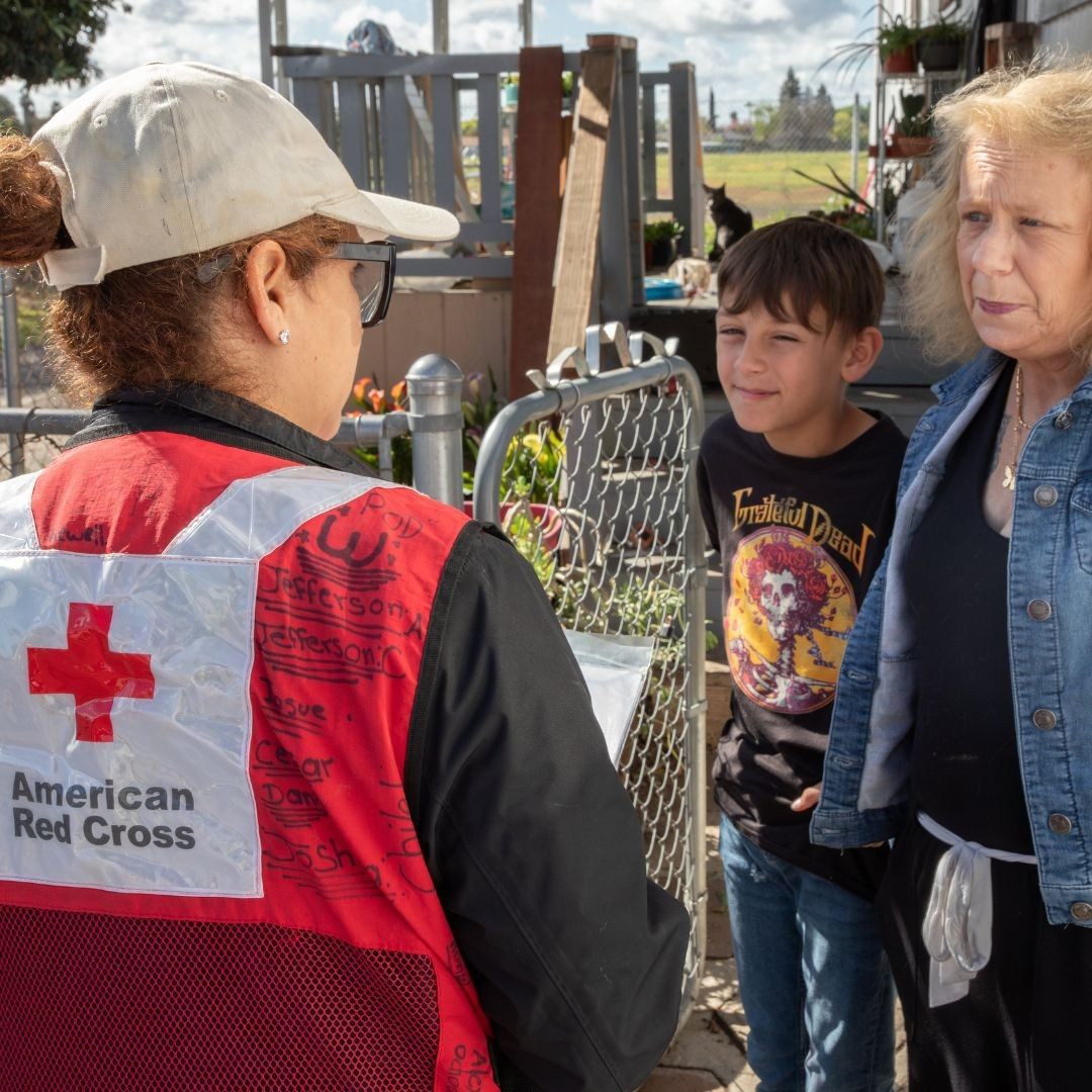 volunteer speaking with residents