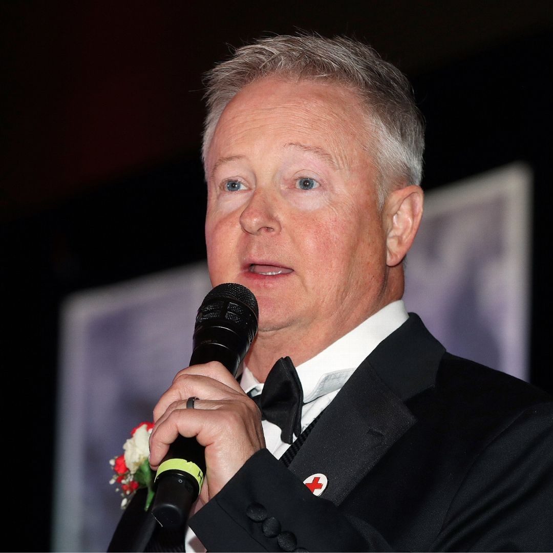 man speaking into microphone