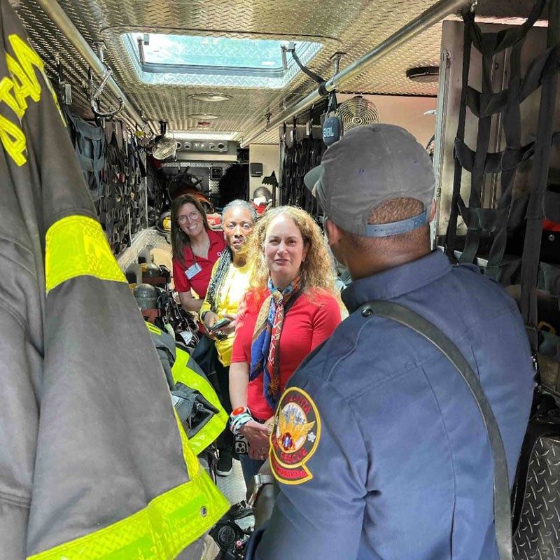 Atlanta firefighter and rescue squad member Terry Clark gives volunteers a tour
