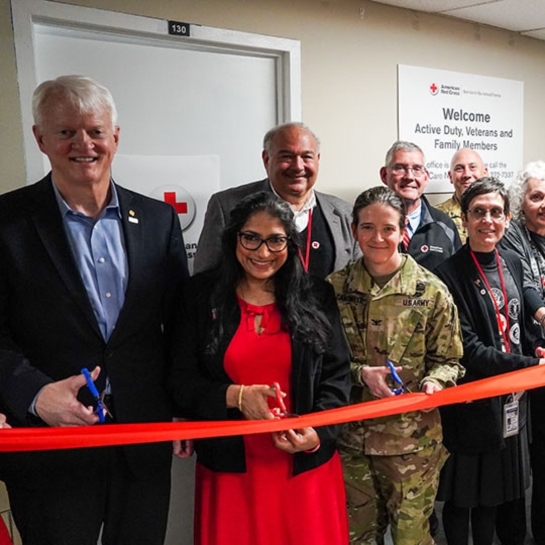 red crossers at ribbon cutting  for office at fort hamilton