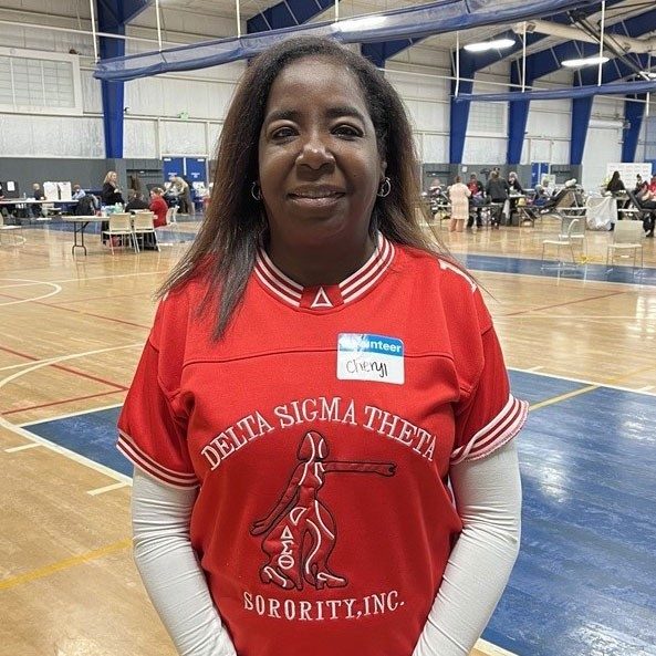 Cheryl Bennett smiles for picture while at a blood donation event.