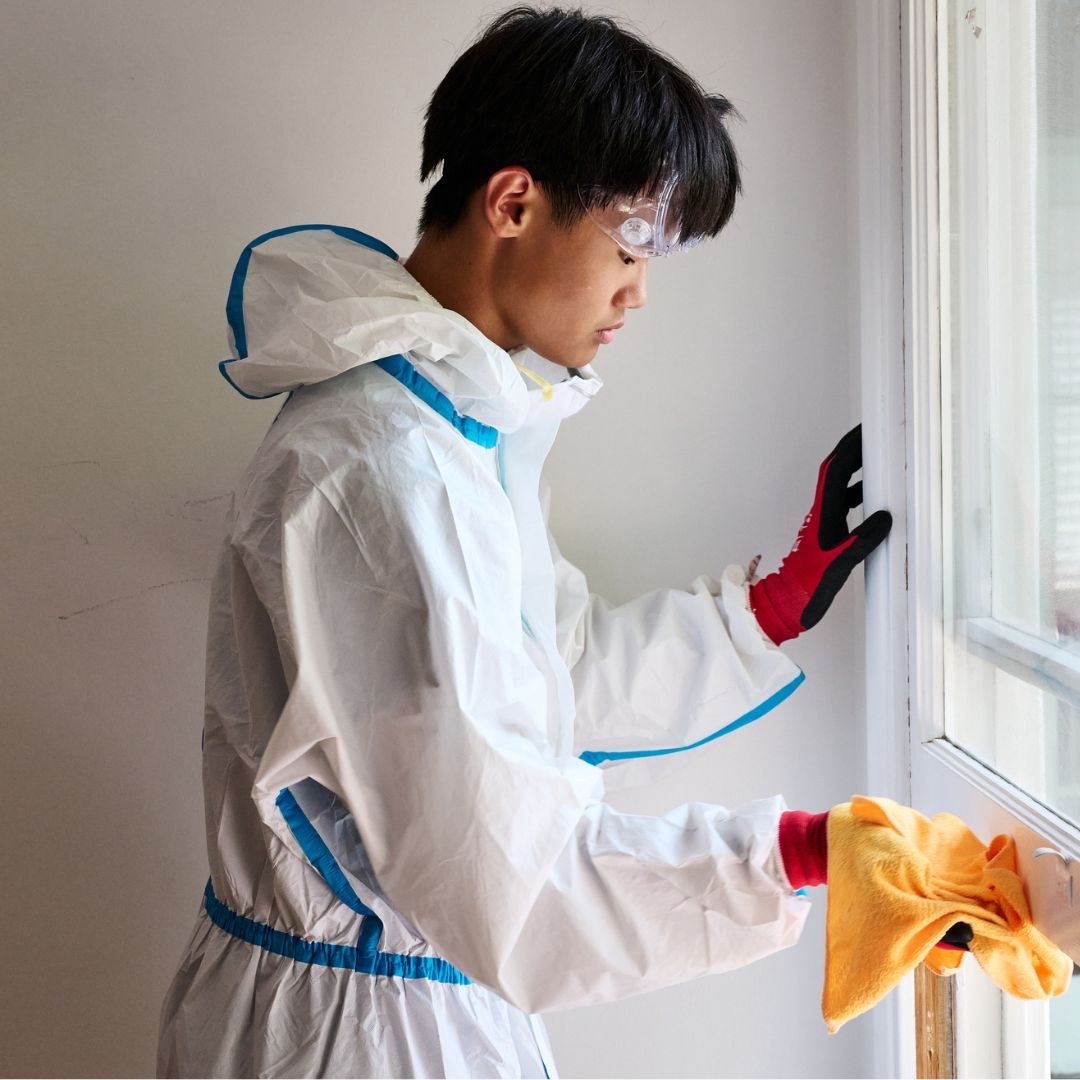 volunteer ricky guo cleaning window
