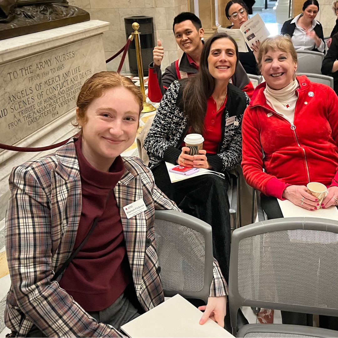 red crossers gathered before presentation