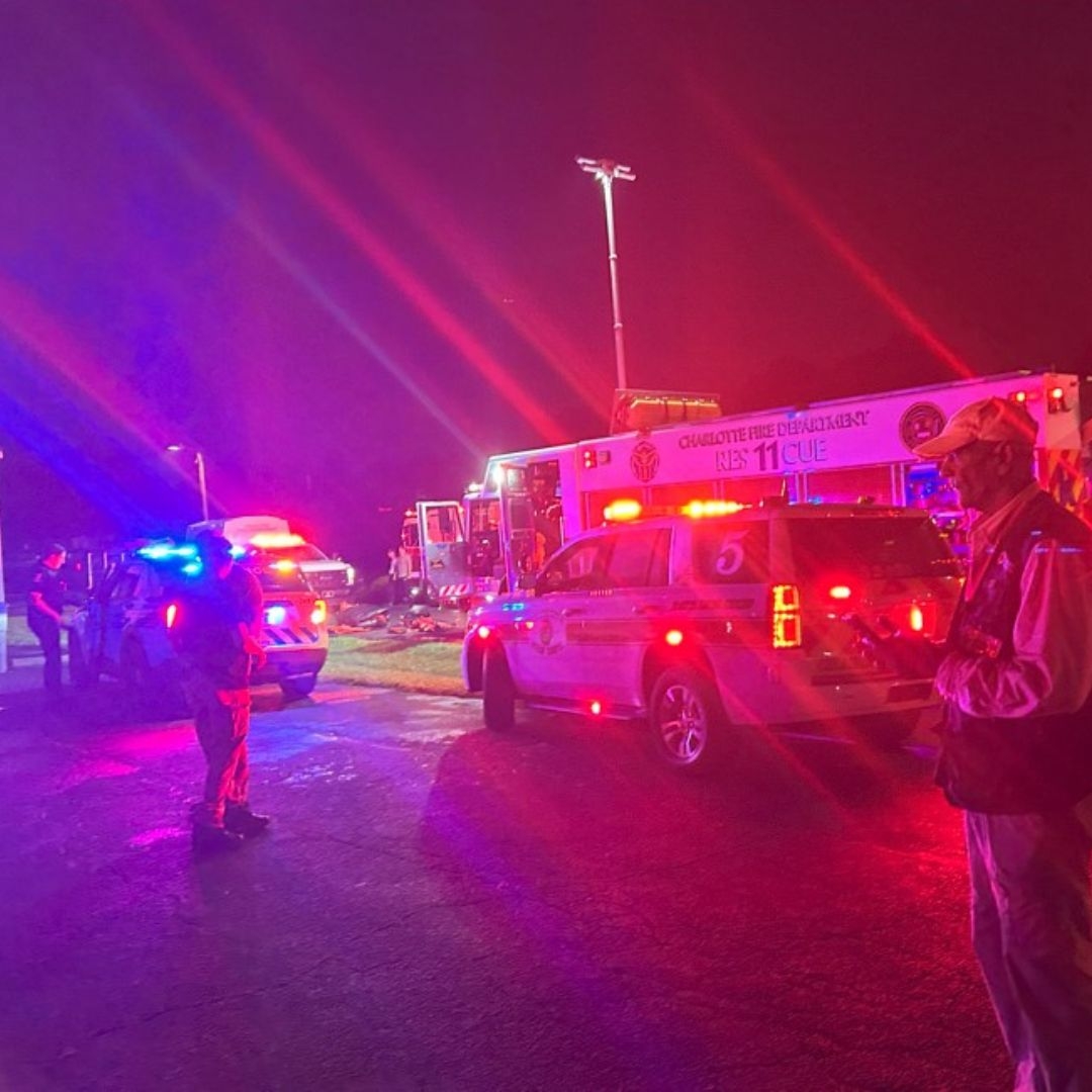 man outside scene with fire truck