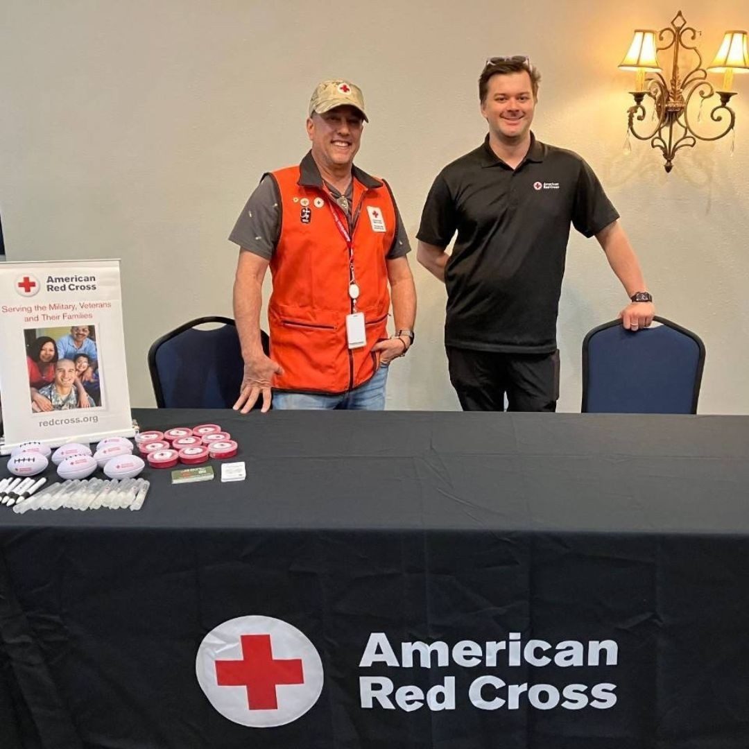 two red crossers at table