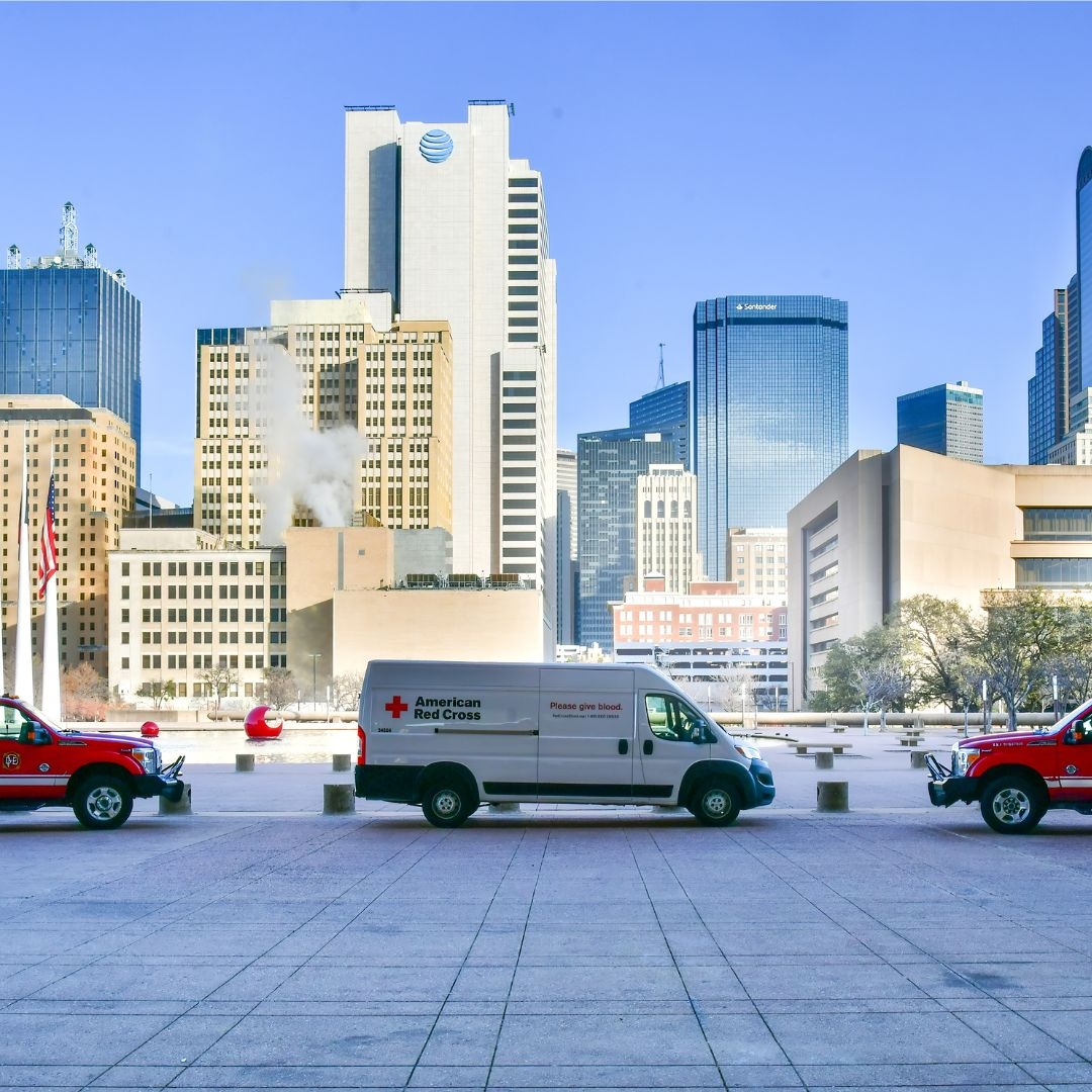 Red Cross blood van parked alongside Dallas Fire-Rescue vehicles