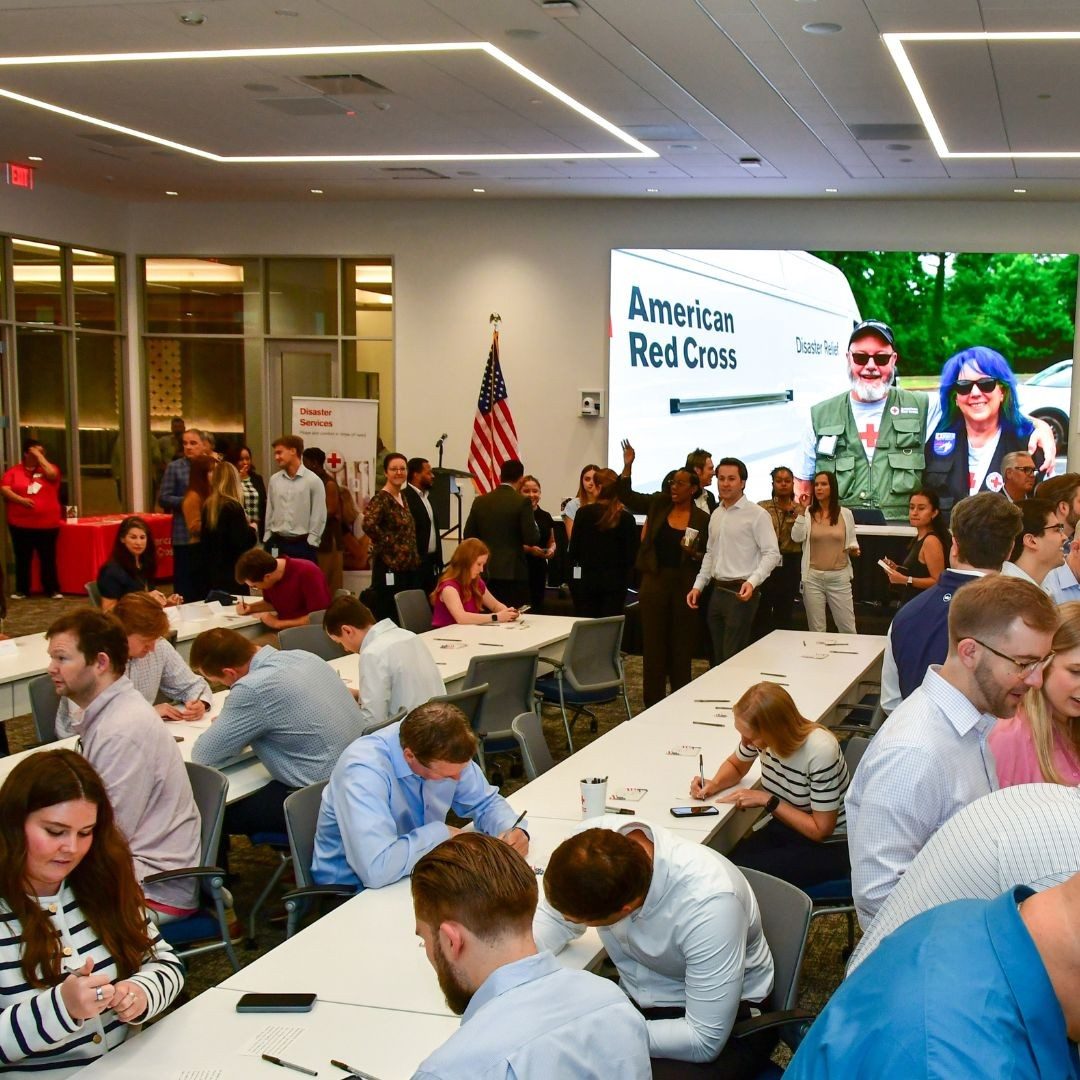 Employees of the Texas Capital Bank sitting at group tables