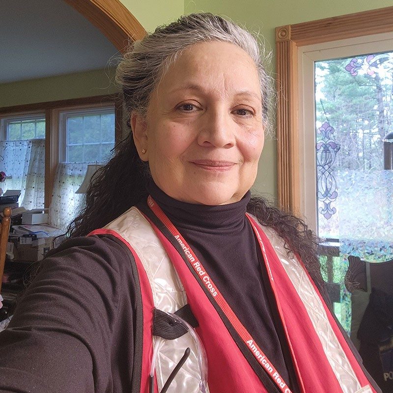 Red Cross volunteer takes a selfie.