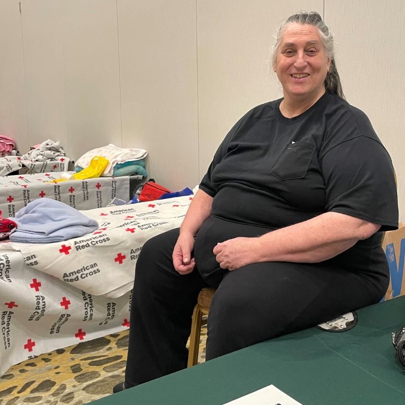 Michelle sitting in a Red Cross shelter.
