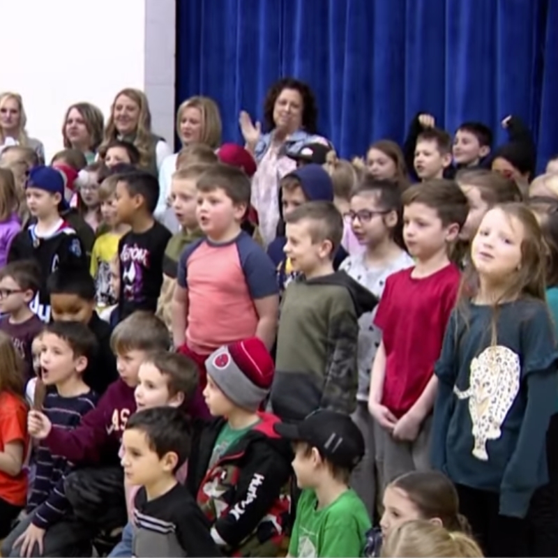 Group of children posing for a picture.