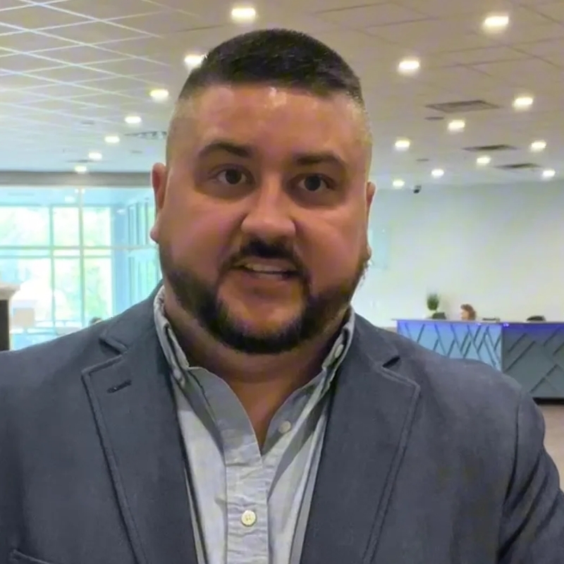 Person speaking to camera.