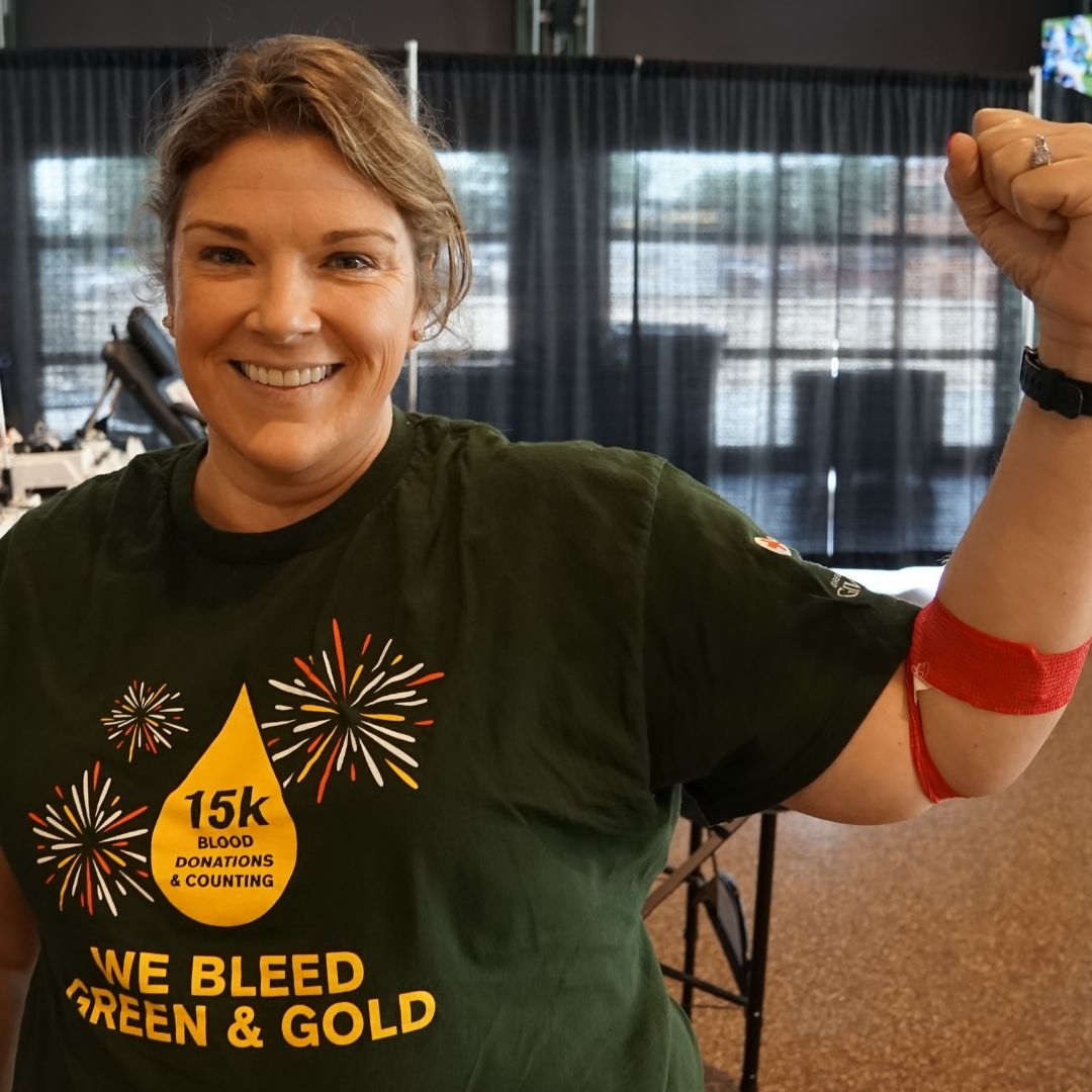green bay packers fan donating blood.