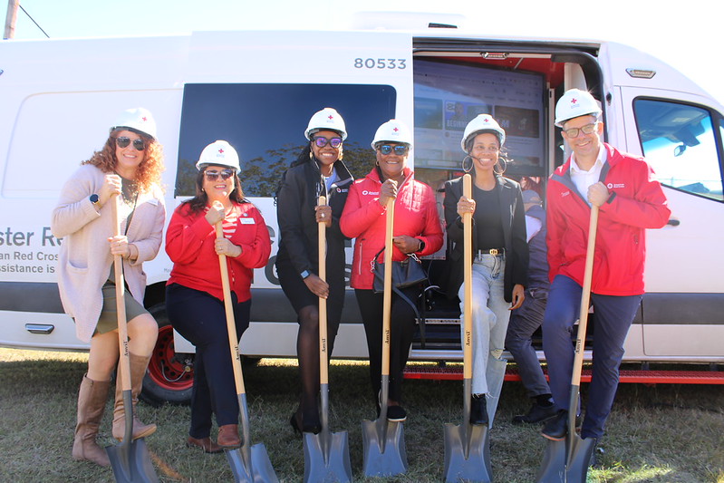 red crossers at ground breaking event