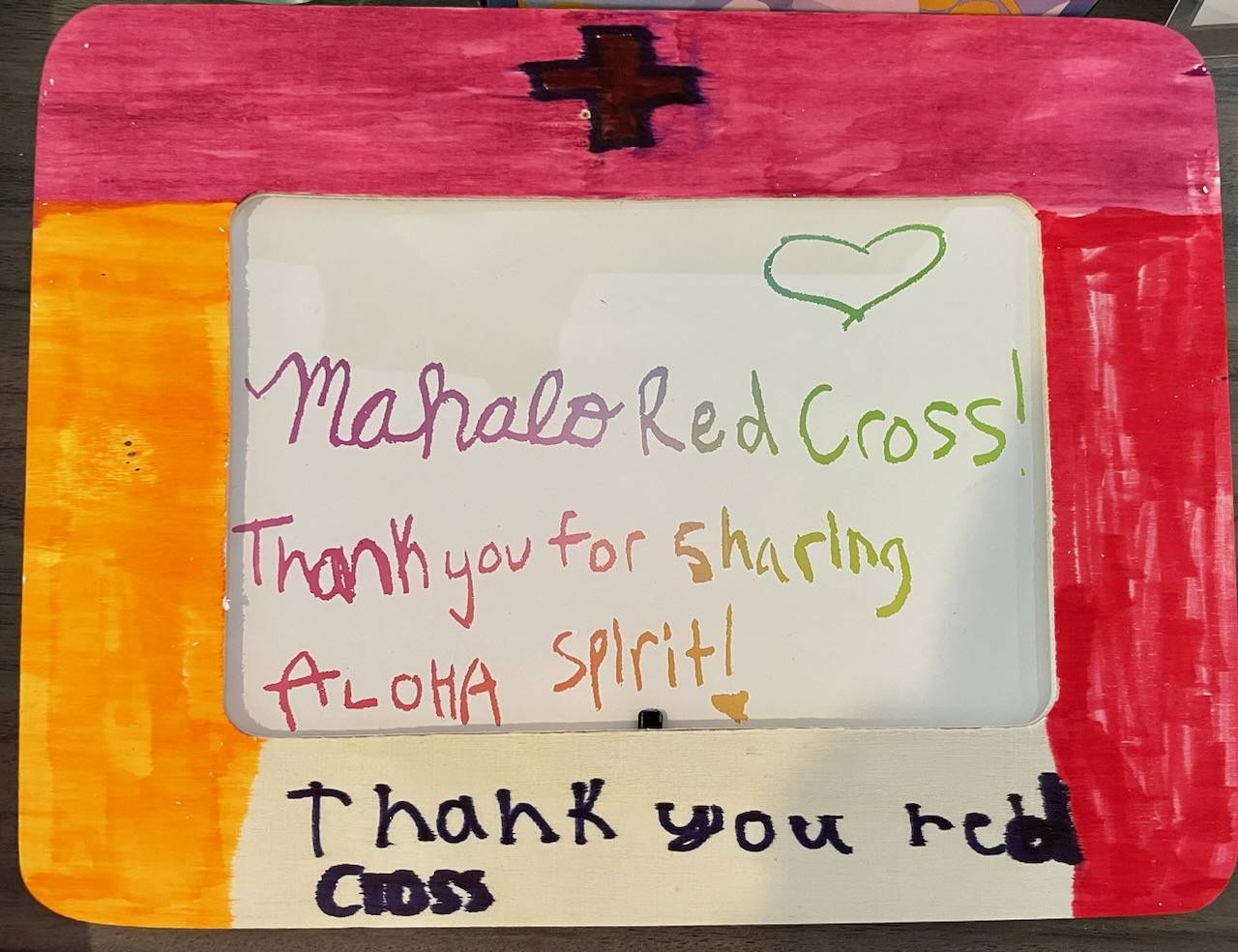 Image of child's art that says thank you Red Cross