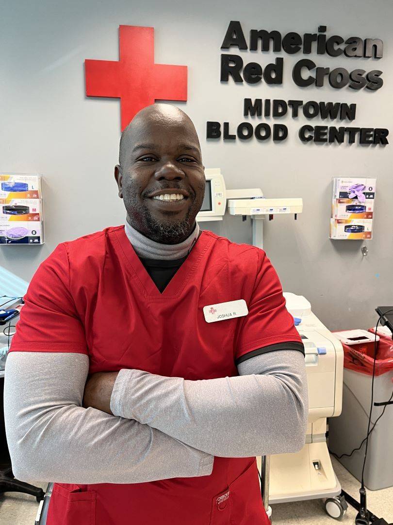 Man stands in American Red Cross blood center
