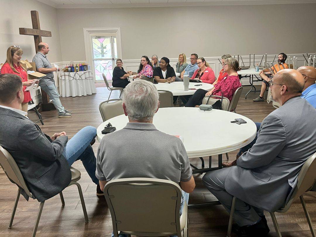 Group meeting at round tables