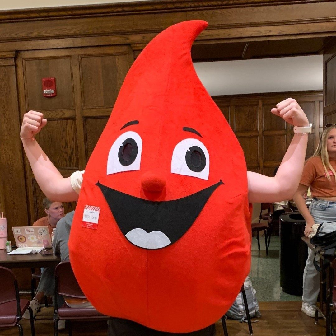 buddy the blood drop doing strong arm pose