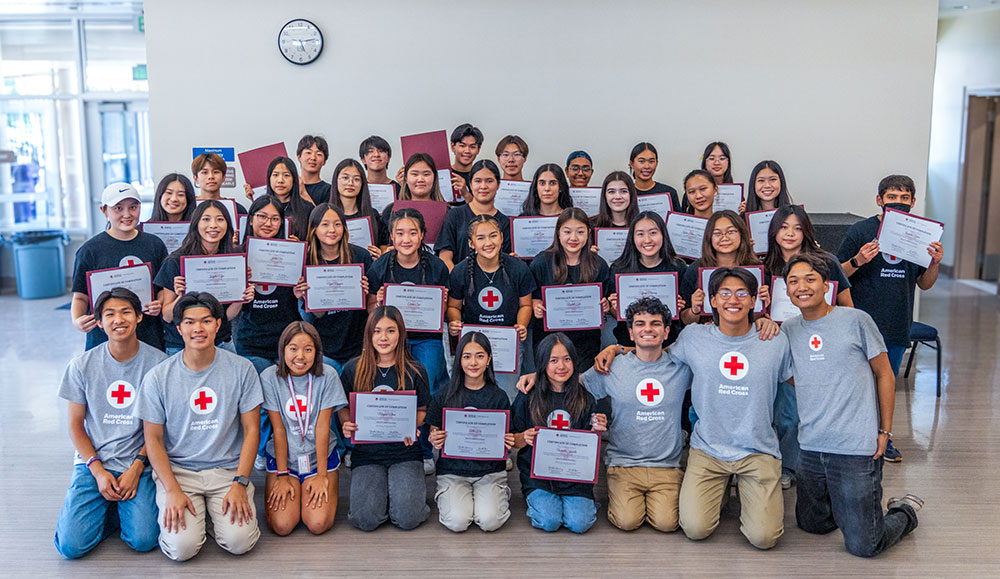 READYTeens Field Day group picture with teens holding up their certificates.