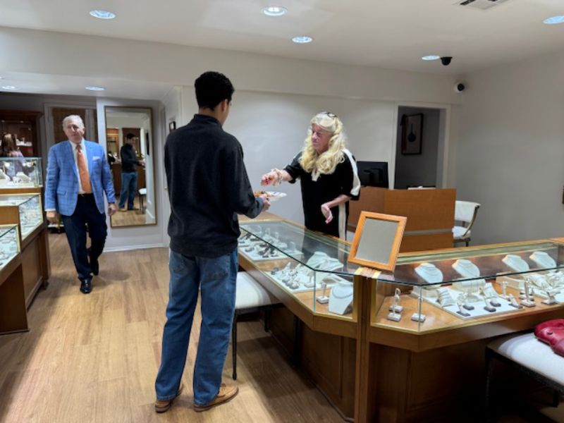 Two peopleina jewlery store