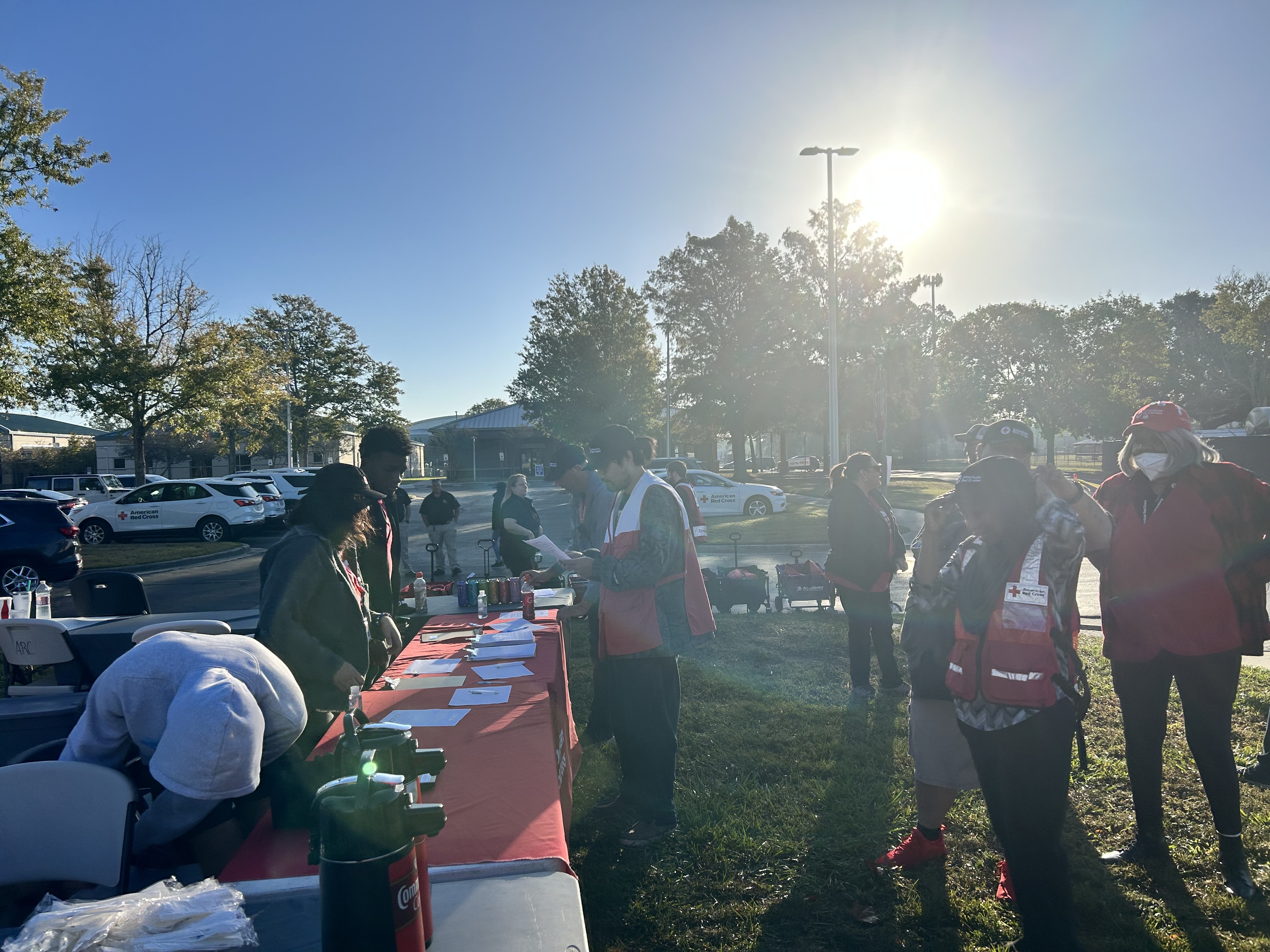 red cross volunteers during sound the alarm event signing up