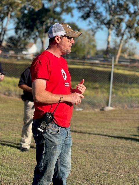 robert, a red cross volunteer giving instructions