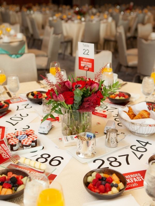 heroes breakfast table with flowers and fruit