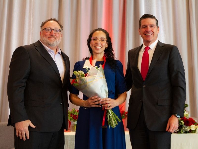 award reciepients holding flowers