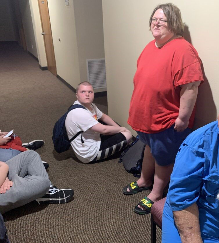 Jennifer Wolfe and son Dillan are in a Red Cross shelter waiting out a storm