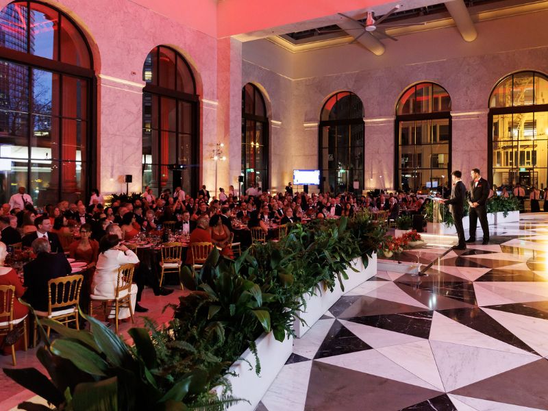 large view of banquet room and gala attendees