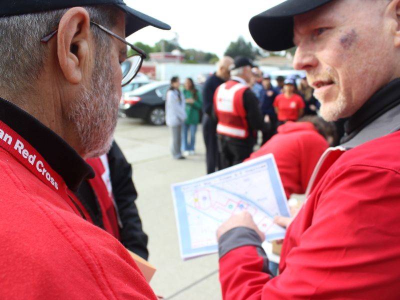 volunteers reviewing maps
