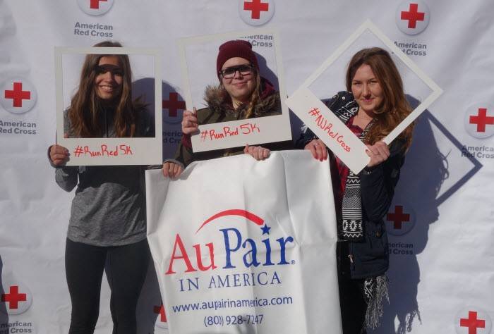 Red Cross runners pose with their medals.