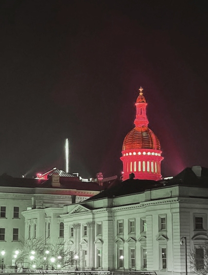 New Jersey State House lit up Red