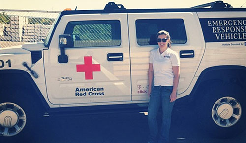 Erin Phillips standing next to American Red Cross vehicle