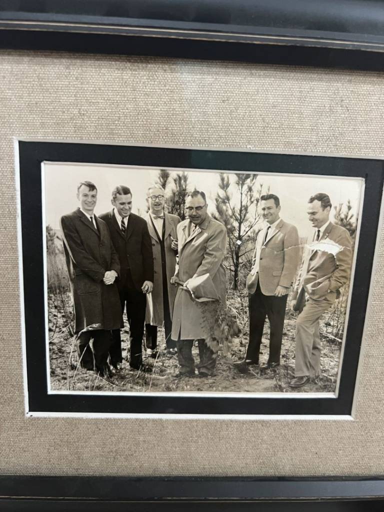 Black and white photo of group of men