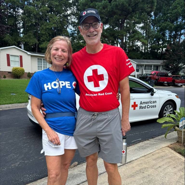 Sue and her husband in Red Cross tshirts.
