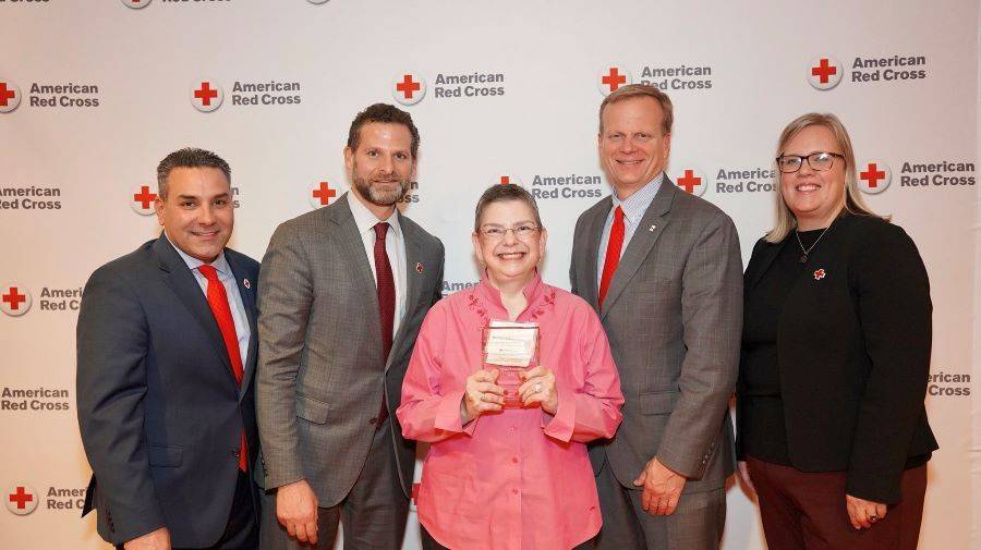 Ellen Silverberg-Brennan recieving award