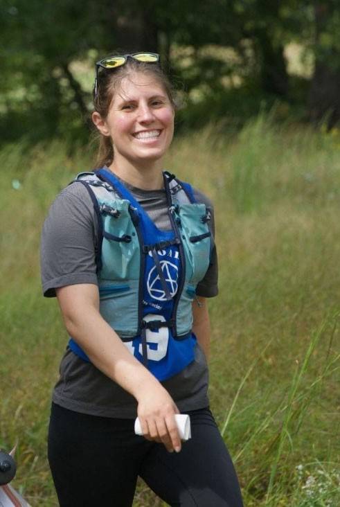 Michele Fisher in outdoor running gear.