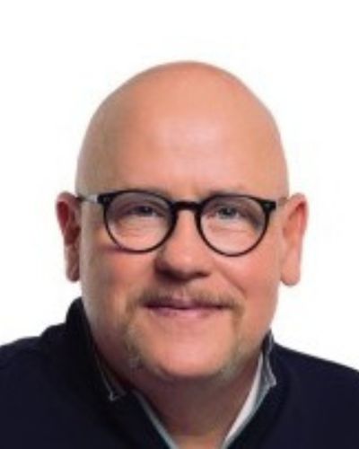 headshot of john mucutcheon