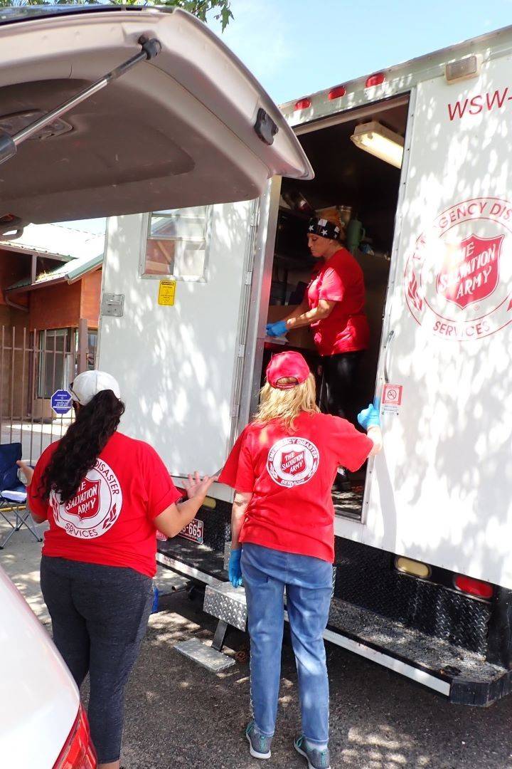Salvation Army volunteers unload truck