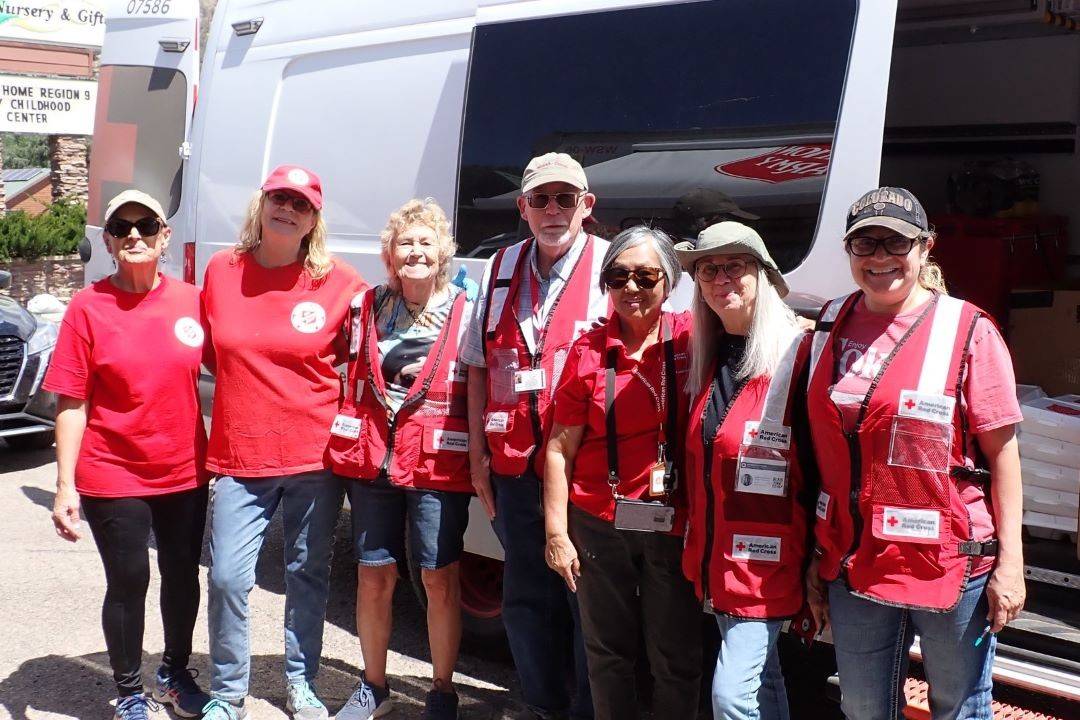 Group photo of Red Cross and Salvation Army volunteers 