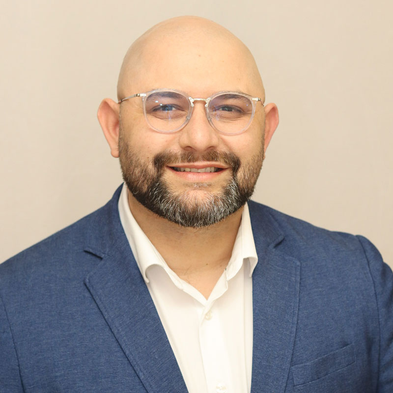 Headshot of Edgar R. Olivo.