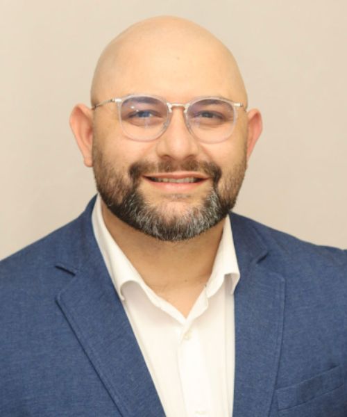 Headshot of Edgar R. Olivo.